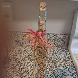 Decorative Glass Bottle with Cork and Natural Accents